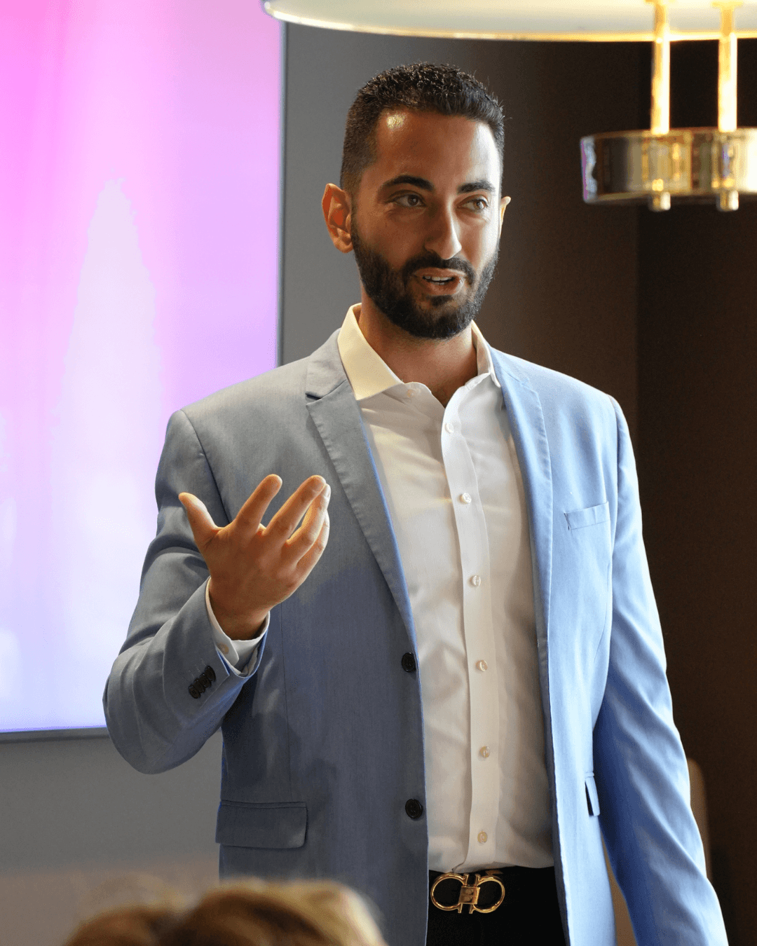 Sam Mollaei presenting